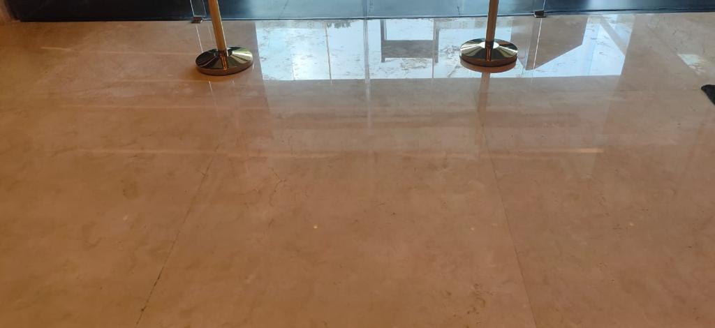 Technicians restoring a marble surface
